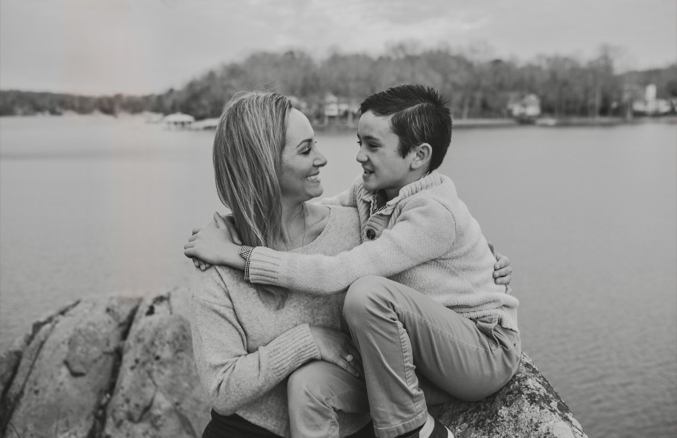 Jenna and her son by the lake